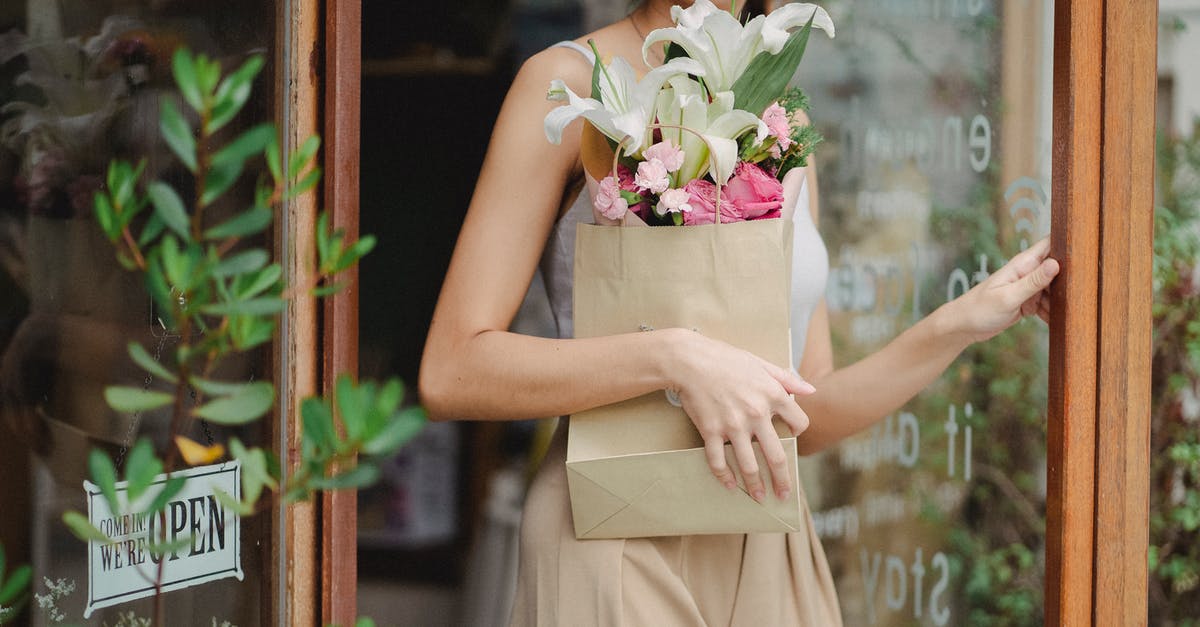 How to turn in FMM and get exit stamp in passport if leaving Mexico by Greyhound bus? - Crop young woman leaving floral shop with tender bouquet How to turn in FMM and get exit stamp in passport if leaving Mexico by Greyhound bus? - Crop young woman leaving floral shop with tender bouquet