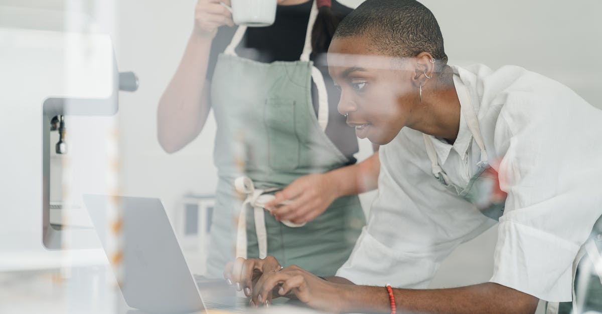 How to understand the registration rules in Serbia? - Black female barista together with colleague using laptop at work How to understand the registration rules in Serbia? - Black female barista together with colleague using laptop at work