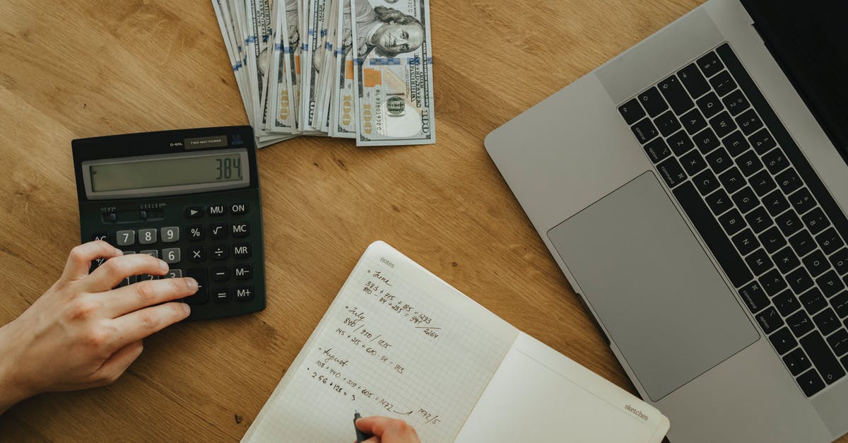 How to unlock WeChat money as a foreigner in China? [closed] - Person Holding White Printer Paper Near Black Ip Phone