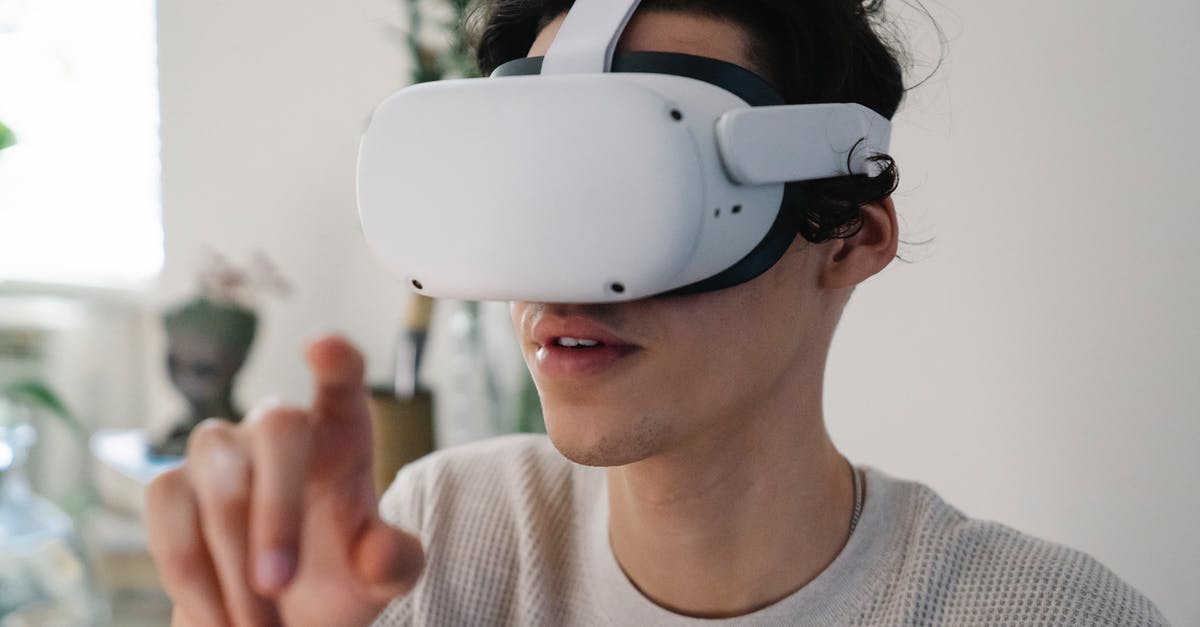 How to use dual flush button in toilet? - Young male interacting with virtual reality headset in apartment How to use dual flush button in toilet? - Young male interacting with virtual reality headset in apartment