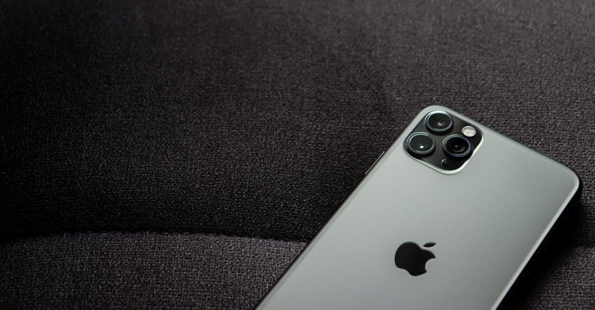 How well do foreign cell phones work in Japan? - Silver Iphone on Black Textile How well do foreign cell phones work in Japan? - Silver Iphone on Black Textile