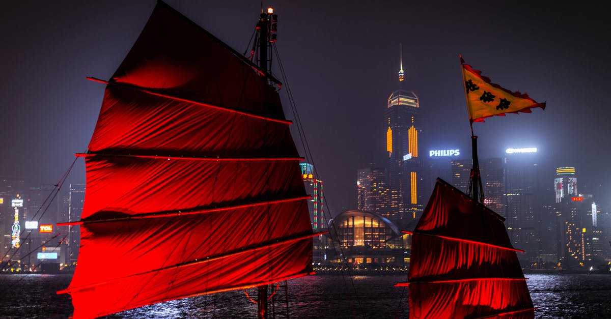 How well is AMEX covered in Hong Kong? - Red Sail Boat on Body of Water Near City Buildings during Night Time How well is AMEX covered in Hong Kong? - Red Sail Boat on Body of Water Near City Buildings during Night Time