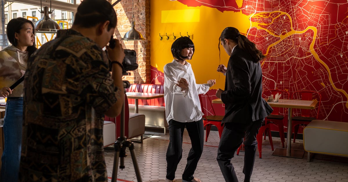 Hypothetical roaming scenarios - A Man and Woman Dancing Inside the Café Hypothetical roaming scenarios - A Man and Woman Dancing Inside the Café