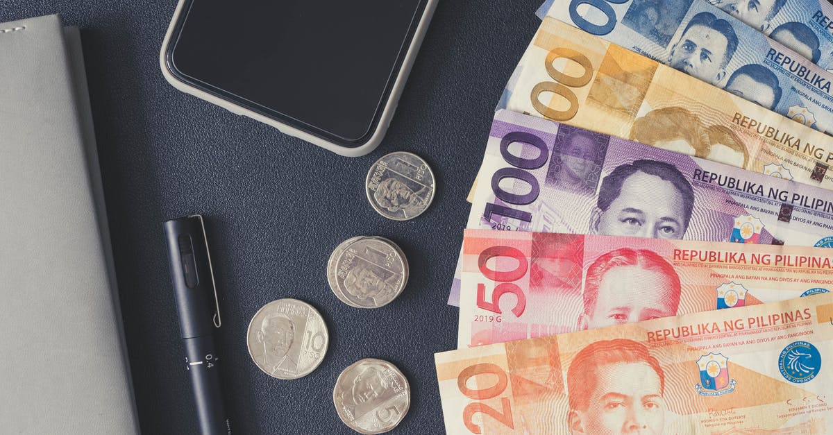 I'm bringing money from Kuwait to Australia via the Philippines - Philippine Money on Black Surface I'm bringing money from Kuwait to Australia via the Philippines - Philippine Money on Black Surface