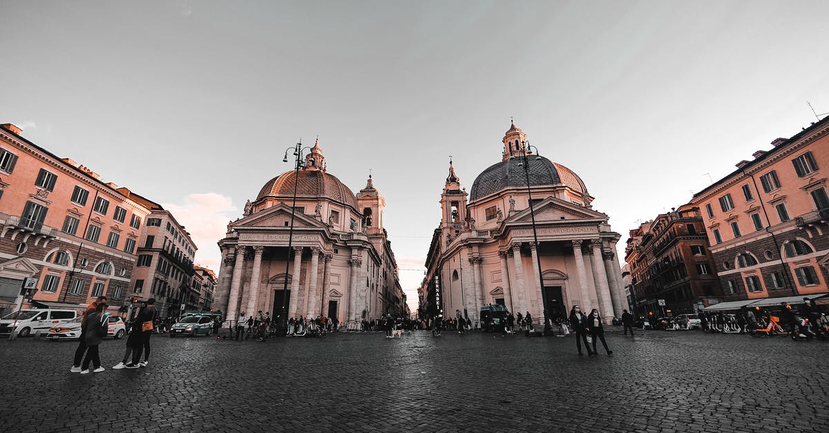 I'm from Mumbai, India. I want to travel to Europe as a tourist but my salary is low ( €190/month) - Old Catholic churches on crowded square