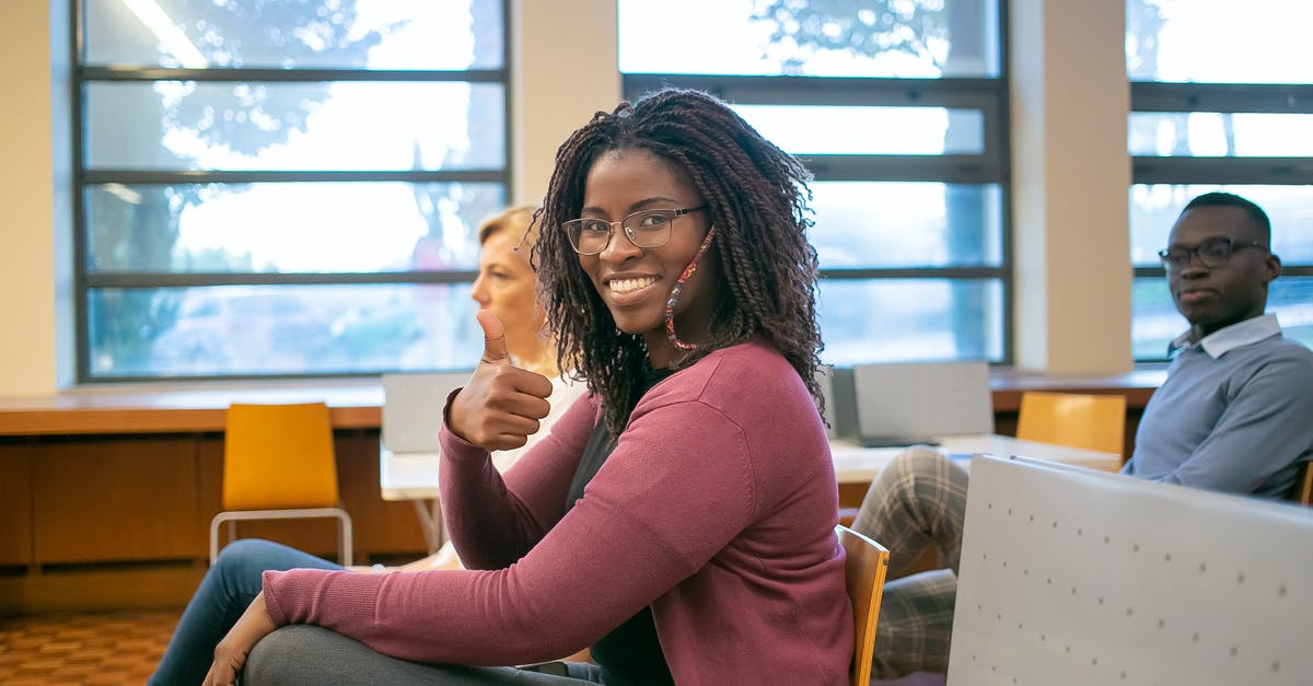 I am a student who wants to apply for a Standard Visitor visa in UK, so i would like to know if the answers provided in my context is enough - Black woman showing thumb up to camera