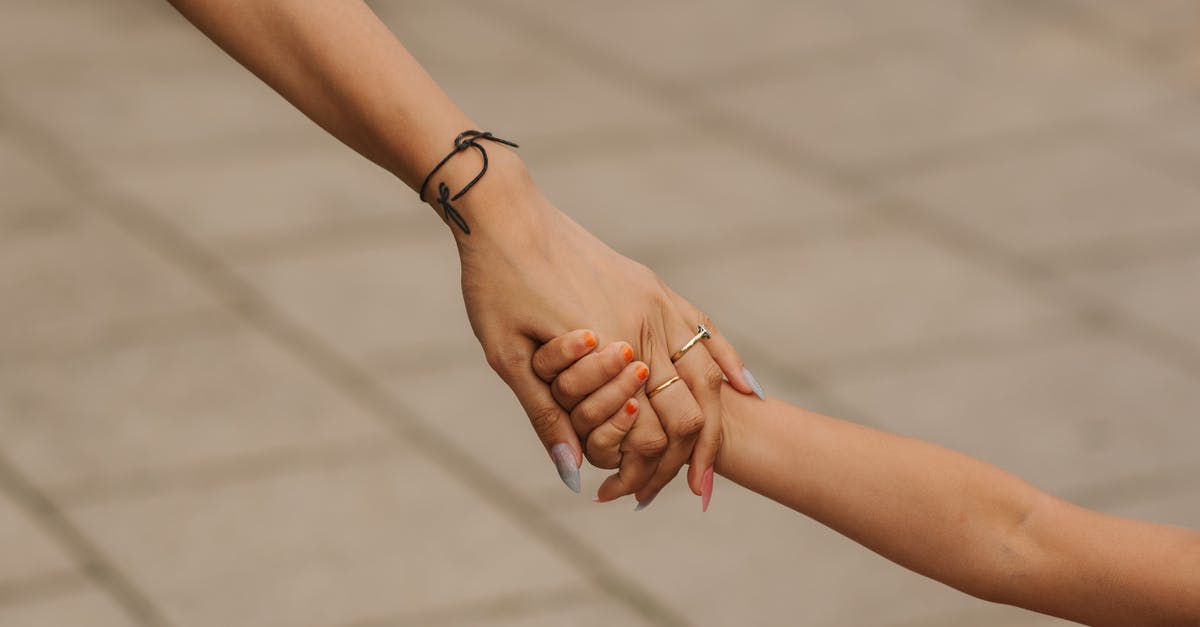 I am British citizen, my children hold a non-EU passport, Schengen visa to Spain was refused, what went wrong? - Crop anonymous woman wearing elegant engagement ring holding hand with child on street in daytime I am British citizen, my children hold a non-EU passport, Schengen visa to Spain was refused, what went wrong? - Crop anonymous woman wearing elegant engagement ring holding hand with child on street in daytime