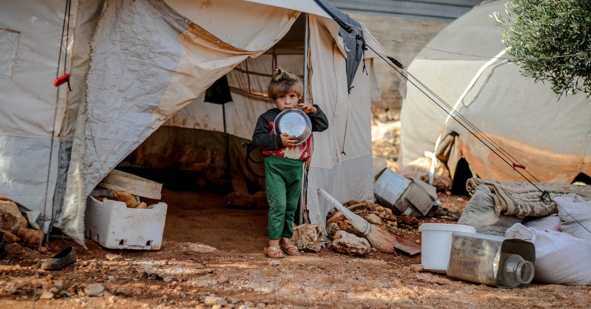 I am interested in visiting a refugee camp. What would be a good place to do so in Europe? [closed] - Little kid near shabby tent