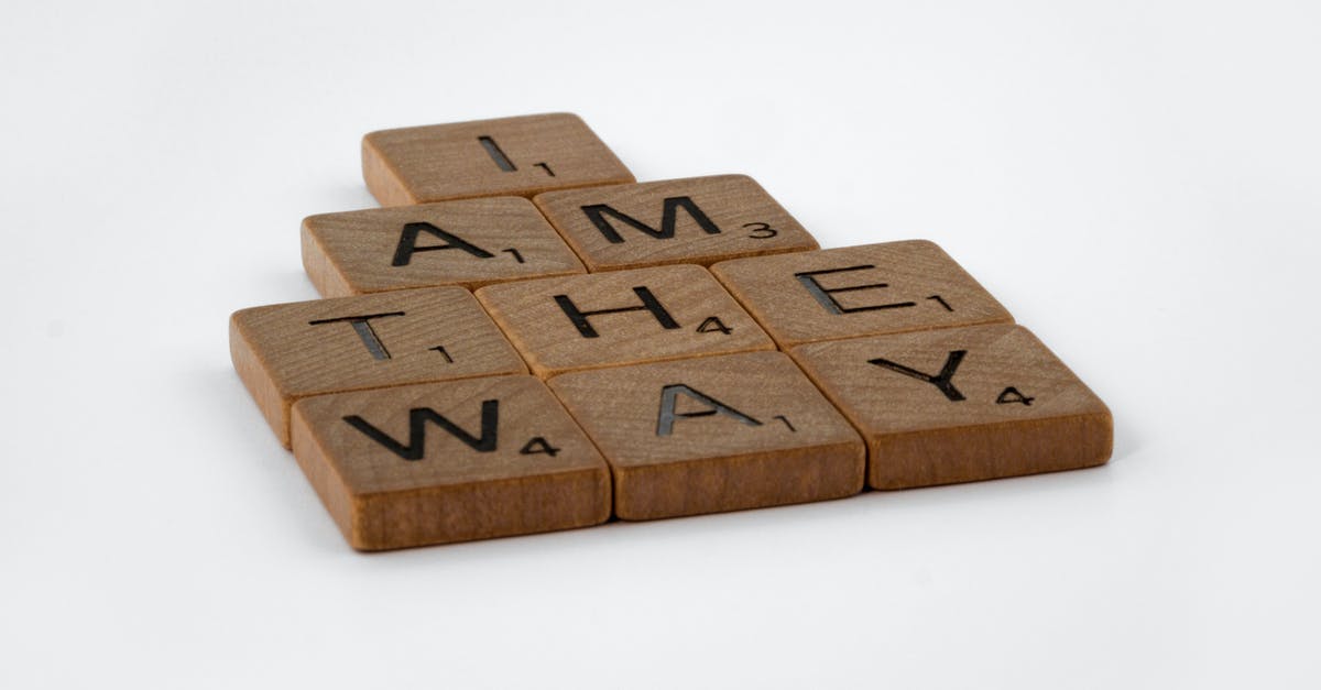 I am trying to find flight numbers and a booking reference - Brown Wooden Scrabble Pieces on White Surface I am trying to find flight numbers and a booking reference - Brown Wooden Scrabble Pieces on White Surface
