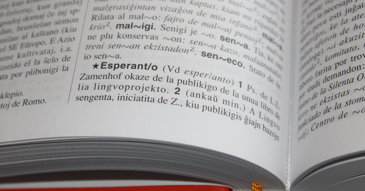 I am trying to find flight numbers and a booking reference - Page of a Dictionary in Close-up Photography I am trying to find flight numbers and a booking reference - Page of a Dictionary in Close-up Photography