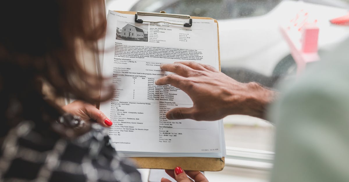 I cannot remember my profile log in details on the US Visa website - A Person Holding a Document
