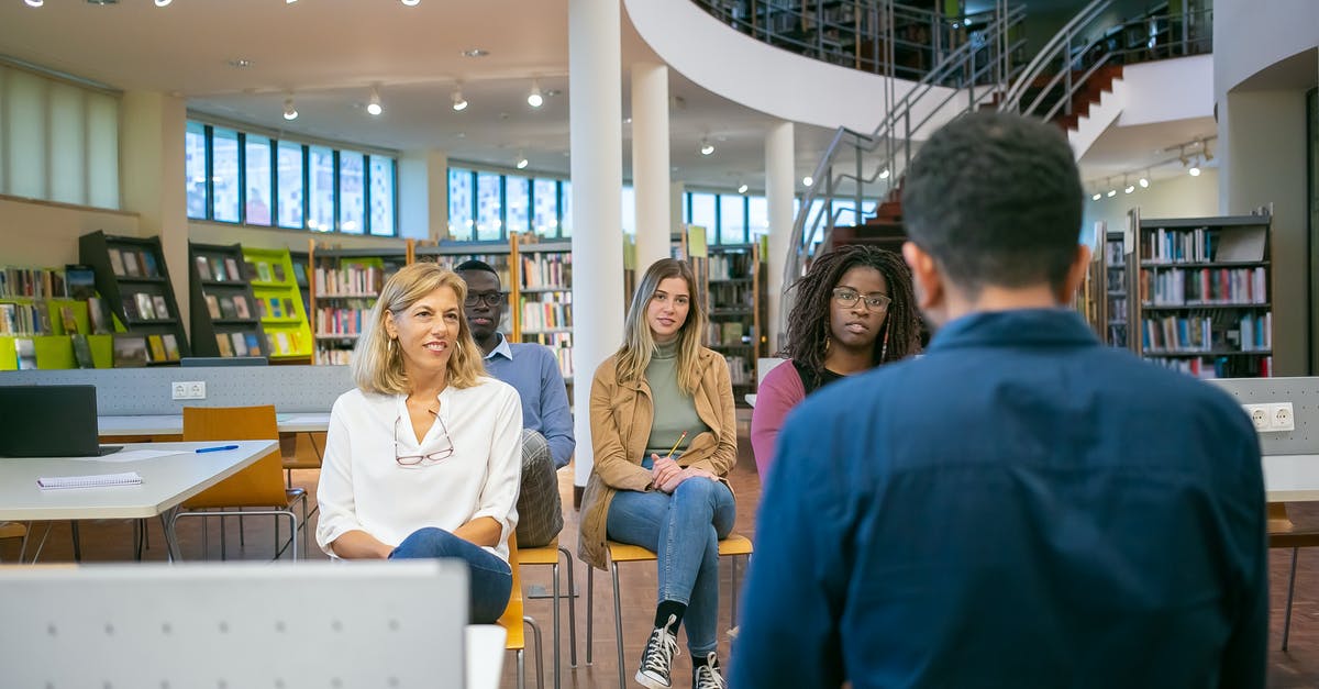 I have a B1/B2 visa that was applied for a conference in US, but I missed the conference. Can I use my visa for an academic visit? - Group of attentive diverse classmates and teacher listening carefully presentation of student at seminar in university class I have a B1/B2 visa that was applied for a conference in US, but I missed the conference. Can I use my visa for an academic visit? - Group of attentive diverse classmates and teacher listening carefully presentation of student at seminar in university class