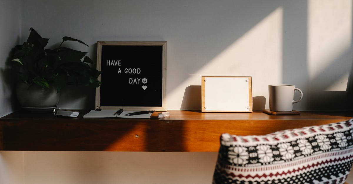 I have an extra legroom seat- can I resell once on board - Chair with cushion placed at wooden shelf with Have A Good Day inscription on black board between potted plant and blank notice board with paper