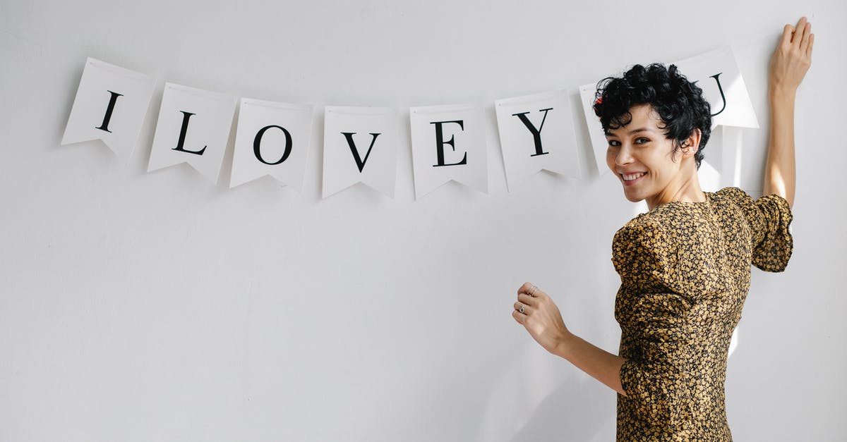 I just left Vietnam. Can I get a new 14-day free entry if I go back sooner than 30 days? - Happy woman decorating wall with inscription I Love You I just left Vietnam. Can I get a new 14-day free entry if I go back sooner than 30 days? - Happy woman decorating wall with inscription I Love You