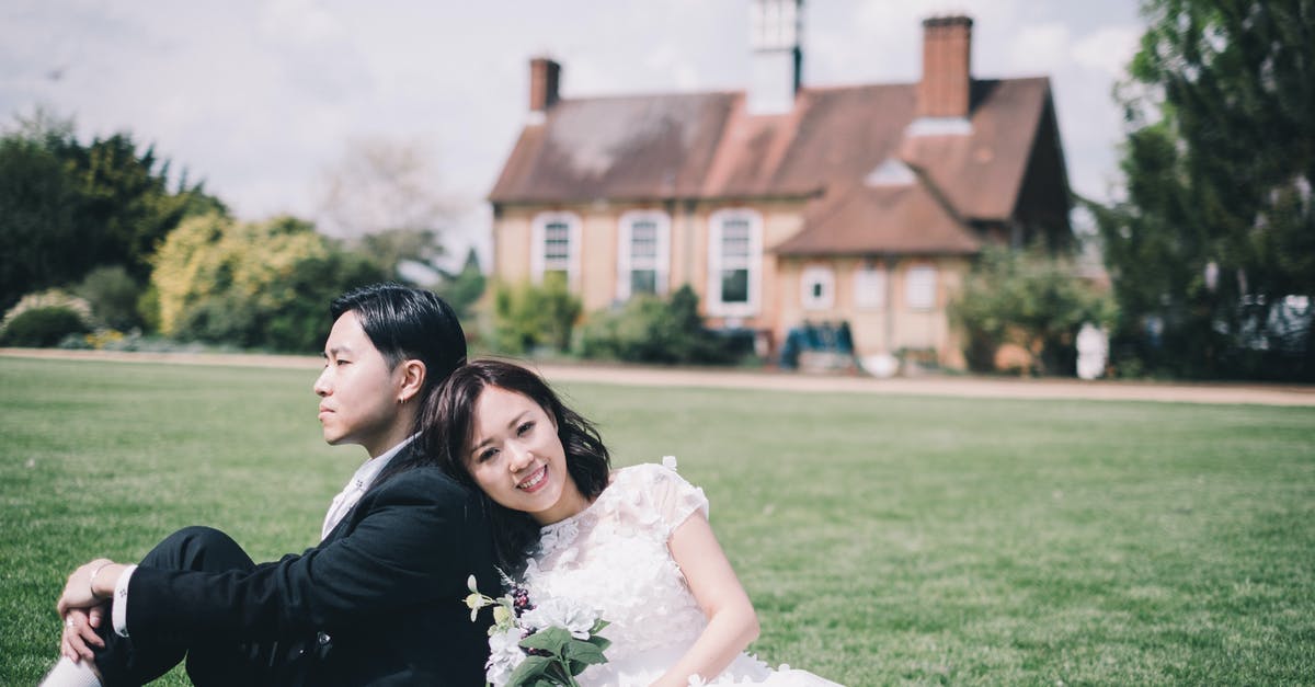 I married an Asian citizen and I'm European. Does my husband need a visa to come to Europe? - Content newlywed Asian couple resting on meadow against cozy mansion I married an Asian citizen and I'm European. Does my husband need a visa to come to Europe? - Content newlywed Asian couple resting on meadow against cozy mansion
