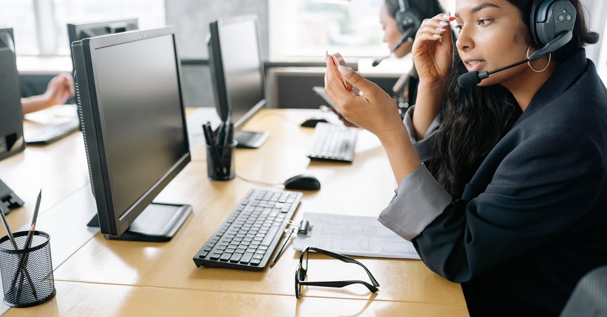 I want bring my desktop pc to the US, will the customs pass it? [duplicate] - Woman Wearing Headset Sitting in Front of a Computer