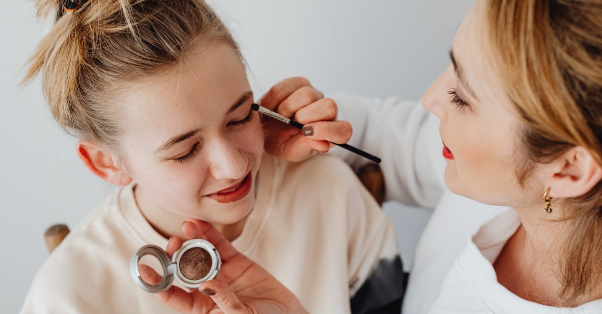 I want to apply for a UK visa for my mother to meet her daughter - Photograph of a Woman Applying Makeup on a Girl I want to apply for a UK visa for my mother to meet her daughter - Photograph of a Woman Applying Makeup on a Girl