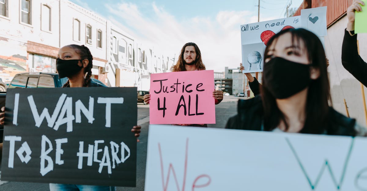 I was on a J1 visa for a year, it has now expired I want to return on an VWP - People Walking on the Street while Holding Placards I was on a J1 visa for a year, it has now expired I want to return on an VWP - People Walking on the Street while Holding Placards
