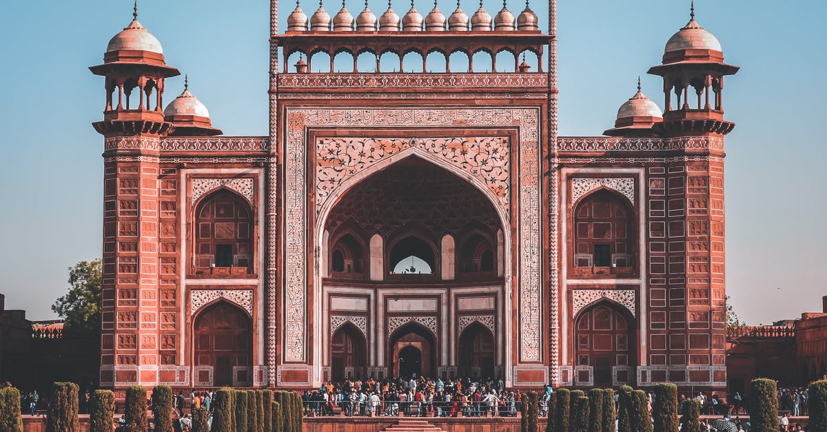 I was refused a Schengen tourist Visa , so how should I reapply? [duplicate] - Magnificent scenery of facade of Taj Mahal with crowd of tourists near entrance on sunny day with blue sky in Agra