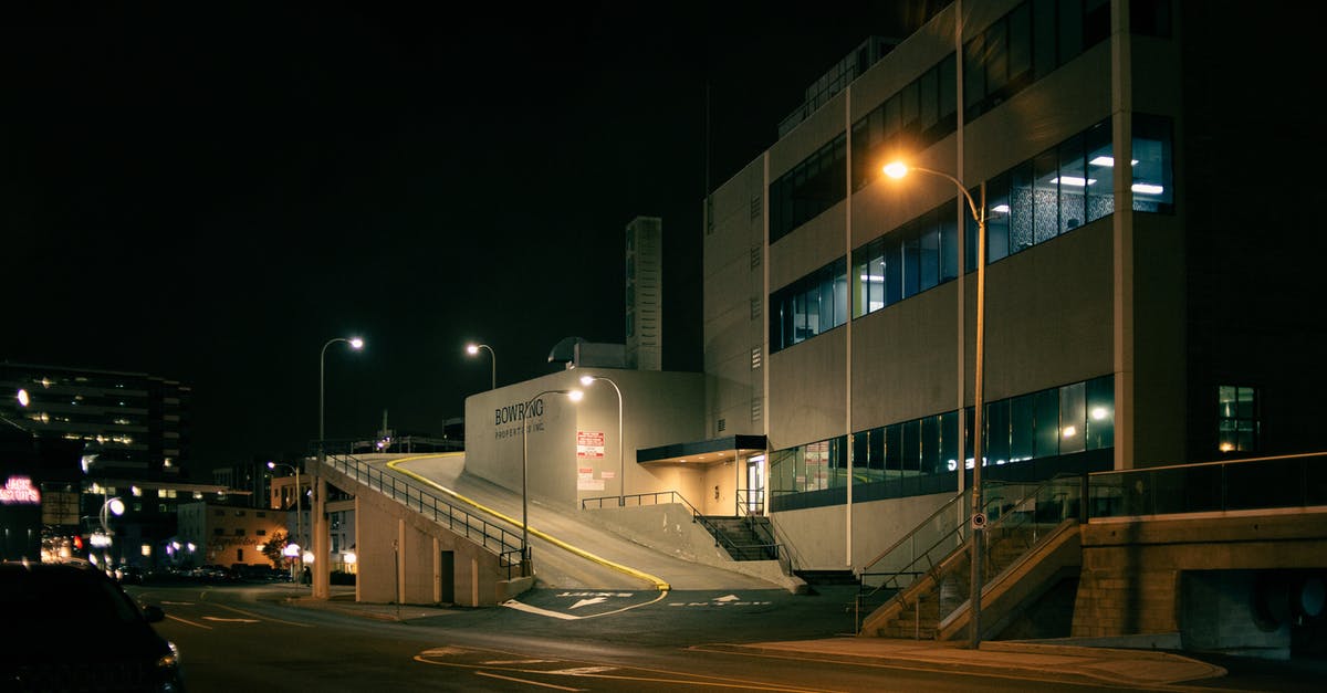 Ibiza car hire late at night - Road leading to building at night Ibiza car hire late at night - Road leading to building at night