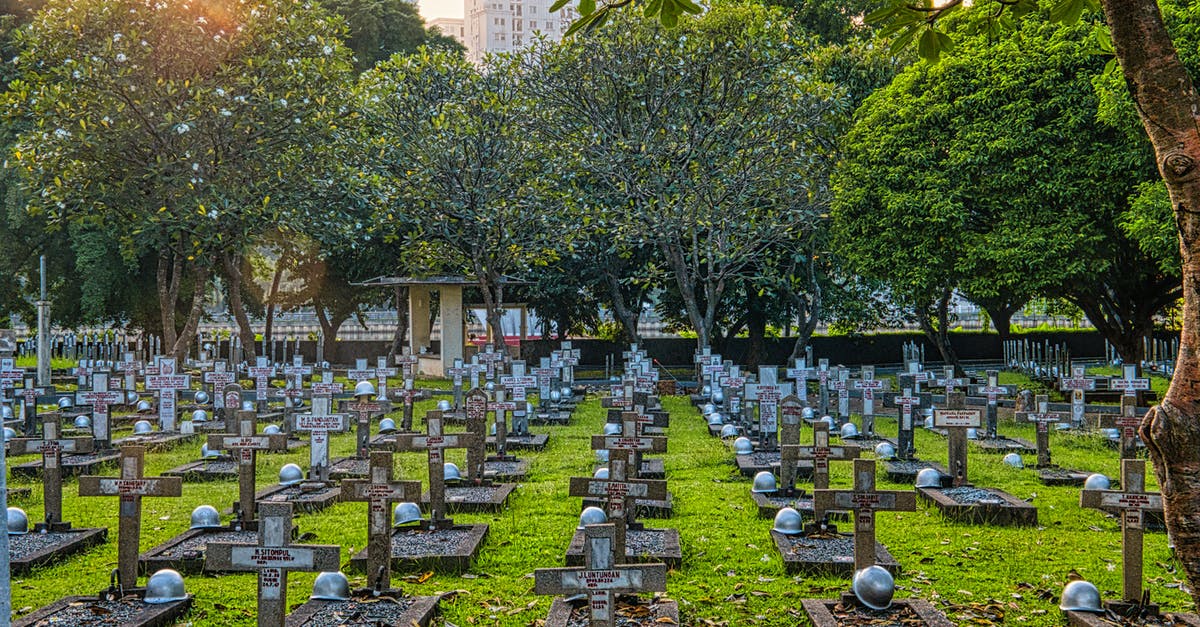 Identify location of old paintings - WWII soldier - Cemetery with gravestones and green trees Identify location of old paintings - WWII soldier - Cemetery with gravestones and green trees