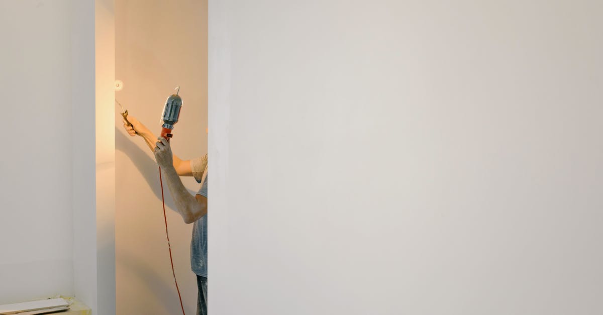 If I change job whilst my ESTA is still valid do I need to reapply or change this info within my ESTA details? [duplicate] - Crop man painting walls in room