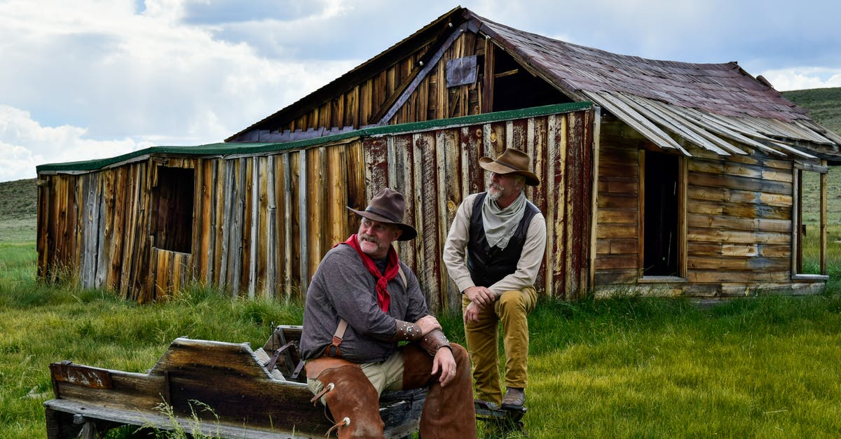 If I live in my home country, should I apply for a UK visa with my home country passport or can I apply with my other country passport? [closed] - Cowboys in an Old Ghost Town