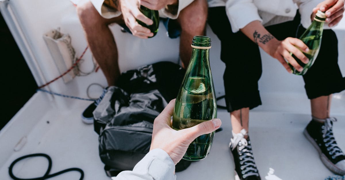 If I manage a trip drinking a little bit of local water without Delhi Belly, am I now fine in future? - Person in White Dress Shirt Holding Green Glass Bottle If I manage a trip drinking a little bit of local water without Delhi Belly, am I now fine in future? - Person in White Dress Shirt Holding Green Glass Bottle