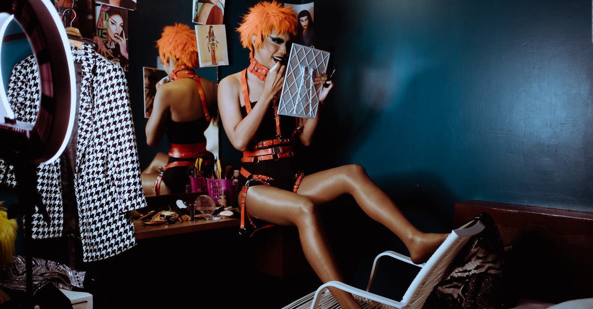 If I stay equal duration in every Schengen country, where do I apply for a visa? - Bizarre woman applying black lipstick in dark room If I stay equal duration in every Schengen country, where do I apply for a visa? - Bizarre woman applying black lipstick in dark room