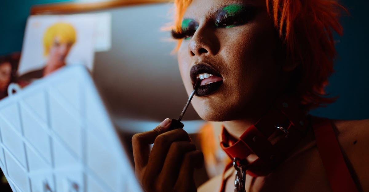 If I stay equal duration in every Schengen country, where do I apply for a visa? - Crop funky woman applying black lipstick If I stay equal duration in every Schengen country, where do I apply for a visa? - Crop funky woman applying black lipstick
