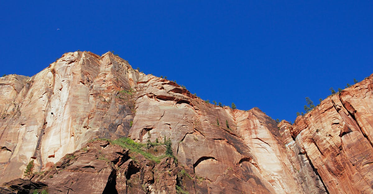 If I visit the Temple Of Sinawava at Zion National Park, how close can we get with our car? - Brown Rocky Mountain Under Blue Sky If I visit the Temple Of Sinawava at Zion National Park, how close can we get with our car? - Brown Rocky Mountain Under Blue Sky