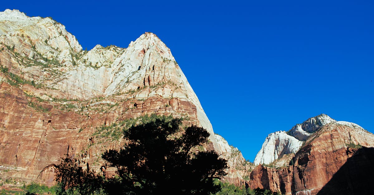 If I visit the Temple Of Sinawava at Zion National Park, how close can we get with our car? - Brown Rocky Mountain Under Blue Sky If I visit the Temple Of Sinawava at Zion National Park, how close can we get with our car? - Brown Rocky Mountain Under Blue Sky