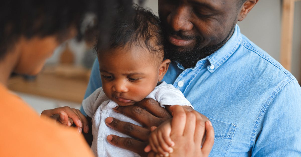 If parents with permanent residency visas arrive in Australia with their two babies who don't have permanent residency visas, can they be turned away? [closed] - Parents Carrying a Baby