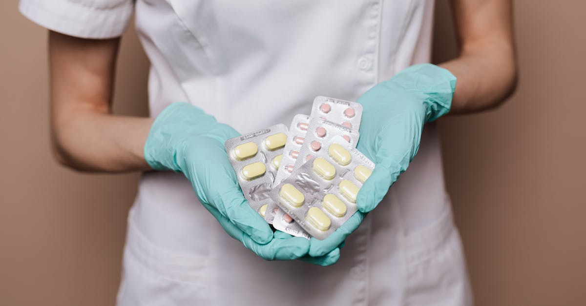If someone becomes unconscious due to a cocktail of prescription medication, would they be held liable for holding up the flight? [closed] - Person Holding Medicines