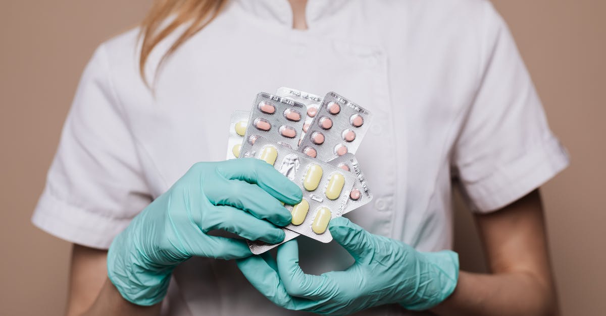 If someone becomes unconscious due to a cocktail of prescription medication, would they be held liable for holding up the flight? [closed] - Person Holding Medicines