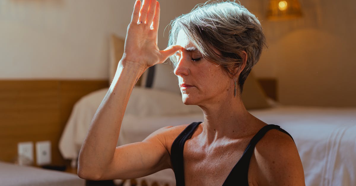 Immigrant visa being refused because i am 23years old [closed] - Elderly Woman Meditating