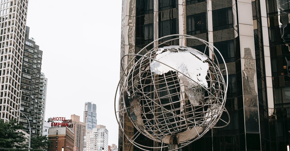 Importing Silver into the US - what duty will I pay? - Contemporary stainless steel unisphere sculpture located near modern skyscrapers against Trump tower on street in New York city on Manhattan Importing Silver into the US - what duty will I pay? - Contemporary stainless steel unisphere sculpture located near modern skyscrapers against Trump tower on street in New York city on Manhattan
