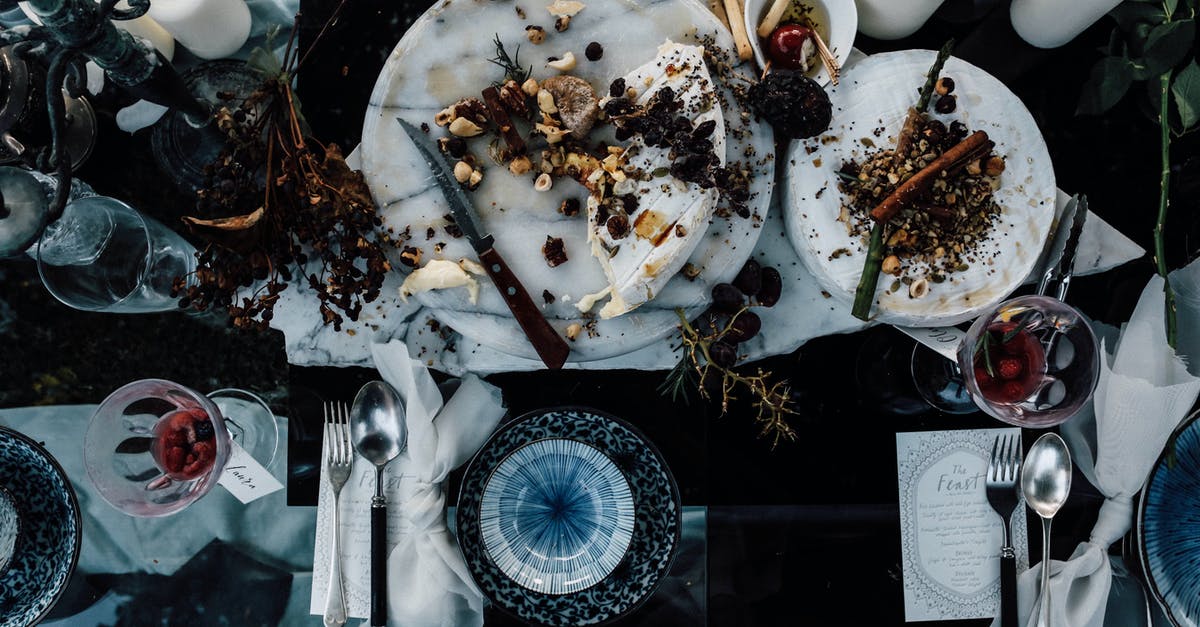 Importing silverware utensil sets to Hong Kong - Banquet table with served food and cutlery Importing silverware utensil sets to Hong Kong - Banquet table with served food and cutlery