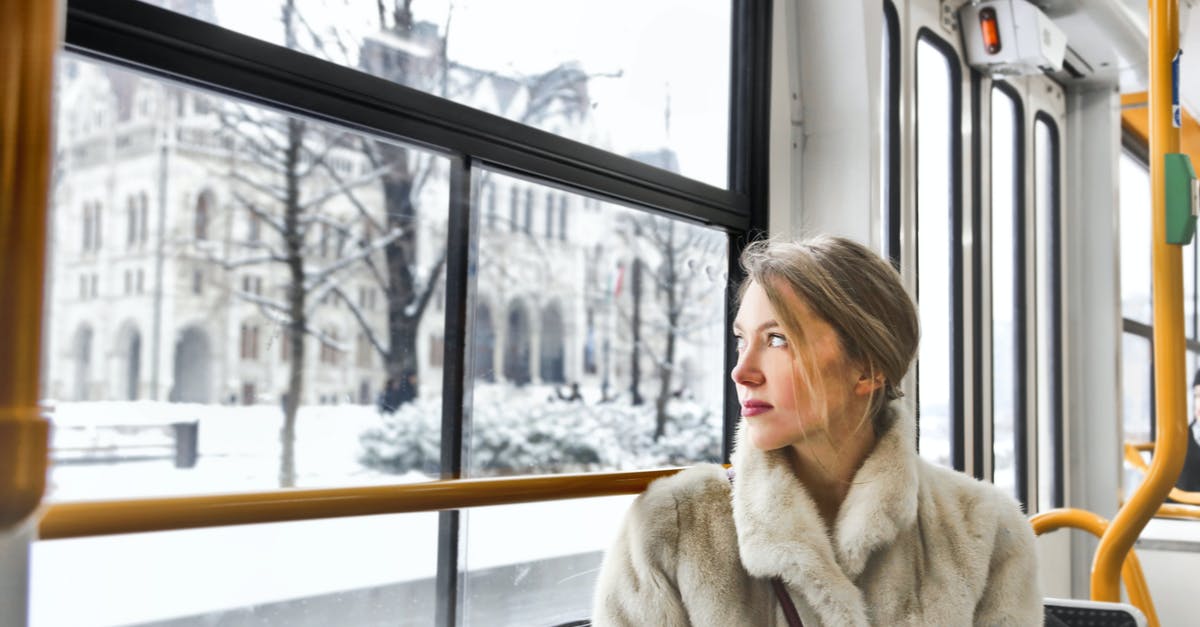 In 1 inch (2.5 cm) of snow, would Amtrak be much faster than a bus? - Cam young woman in warm clothes in public transport In 1 inch (2.5 cm) of snow, would Amtrak be much faster than a bus? - Cam young woman in warm clothes in public transport