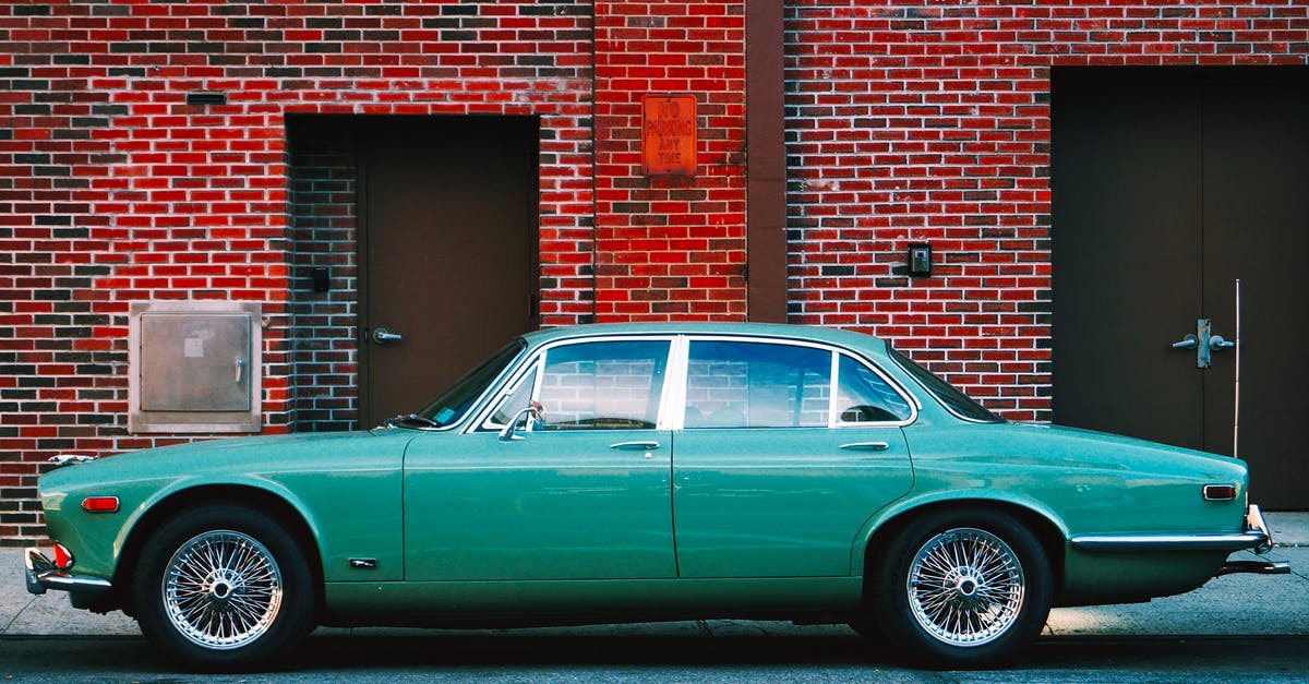 In California, is it always legal to drive with your car headlight on? - Vintage Car in City