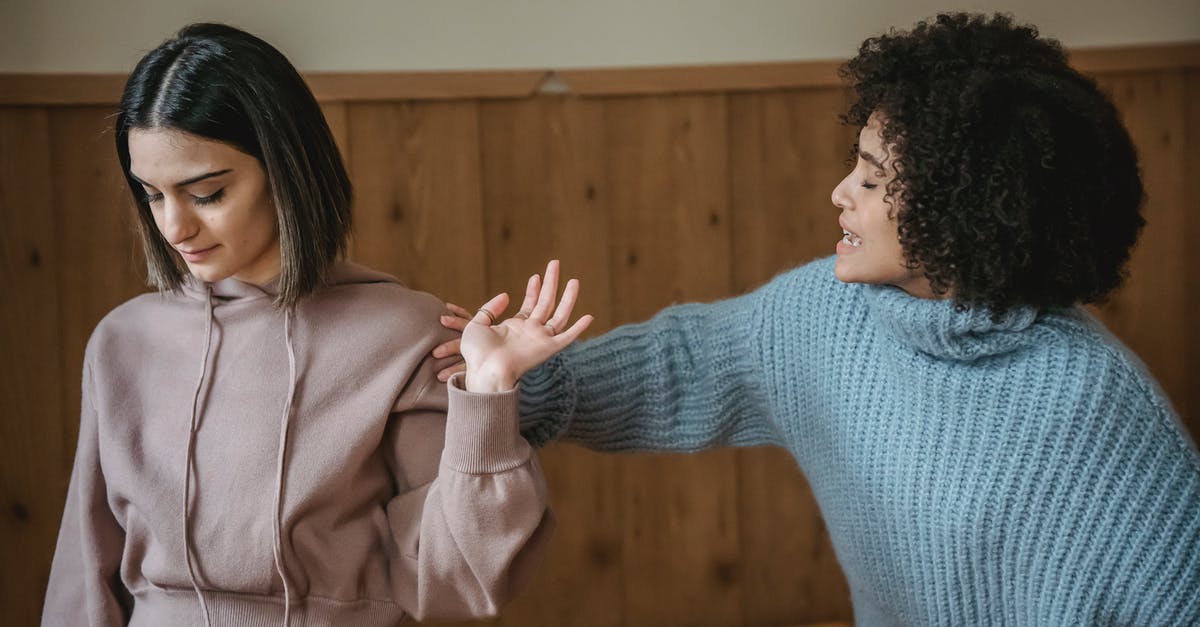 In Japan, is it considered rude to talk on the train? - Diverse women quarreling in room In Japan, is it considered rude to talk on the train? - Diverse women quarreling in room