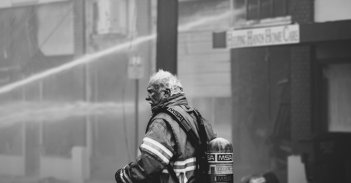 In Poland, is/are there any region dangerous for non-white people to visit? - Grayscale Photo of Firefighter In Poland, is/are there any region dangerous for non-white people to visit? - Grayscale Photo of Firefighter