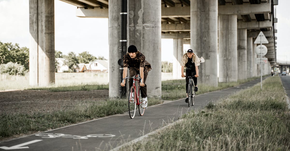 In Rio de Janeiro, which lane should I be using when biking and there's a bus-only lane? - Men Riding Their Bike in the Bike Lane In Rio de Janeiro, which lane should I be using when biking and there's a bus-only lane? - Men Riding Their Bike in the Bike Lane