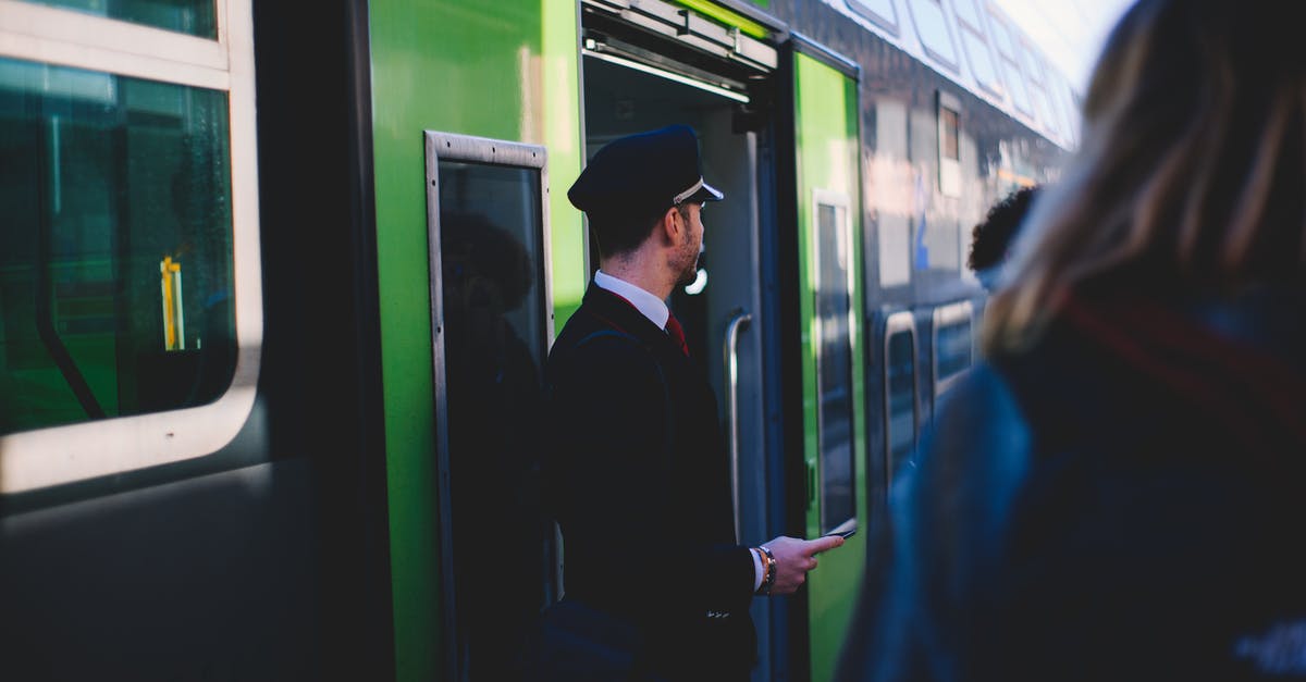 In Taiwan, must you reserve train tickets in advance, or can you buy tickets a few minutes before trains are supposed to depart? - Man in Black Suit Standing Beside Train In Taiwan, must you reserve train tickets in advance, or can you buy tickets a few minutes before trains are supposed to depart? - Man in Black Suit Standing Beside Train