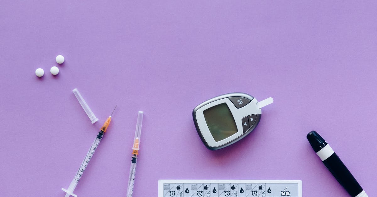 In transit with controlled medication - Diabetic Kit and Medicines over a Purple Surface In transit with controlled medication - Diabetic Kit and Medicines over a Purple Surface