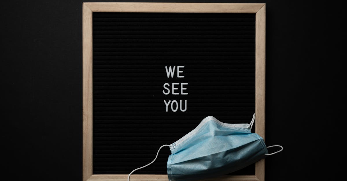 In what situation we can see the aurora in Fairbanks? - From above blackboard in wooden frame with white text on center under medical mask against black background In what situation we can see the aurora in Fairbanks? - From above blackboard in wooden frame with white text on center under medical mask against black background