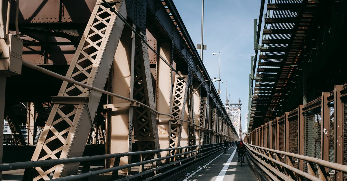 In what states is the left lane only for passing? - Pedestrian roadway on cantilever bridge in sunny day In what states is the left lane only for passing? - Pedestrian roadway on cantilever bridge in sunny day