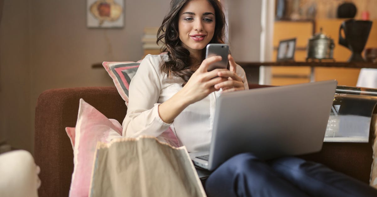 In which bag laptop charger and laptop battery can be taken? And in which bag food can be taken? [closed] - Photo of a Woman Using Her Smartphone