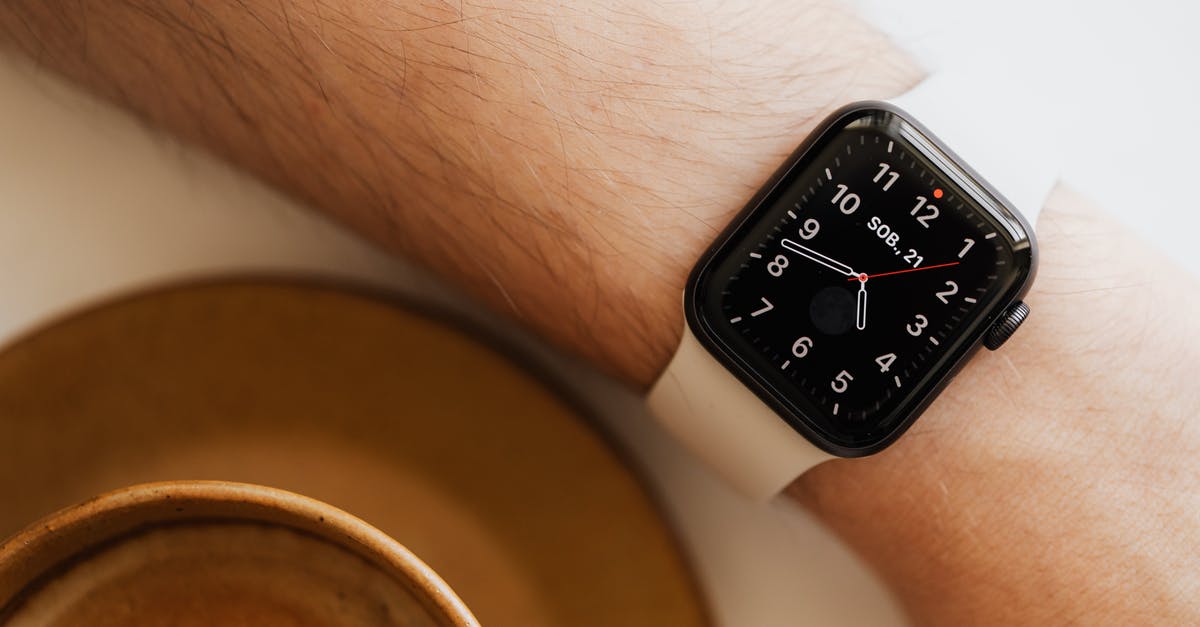 In which countries Electronic items purchased from India can be used without any voltage converter and vice versa? [closed] - From above closeup of crop man hand with smart watch near cup of hot americano on white background
