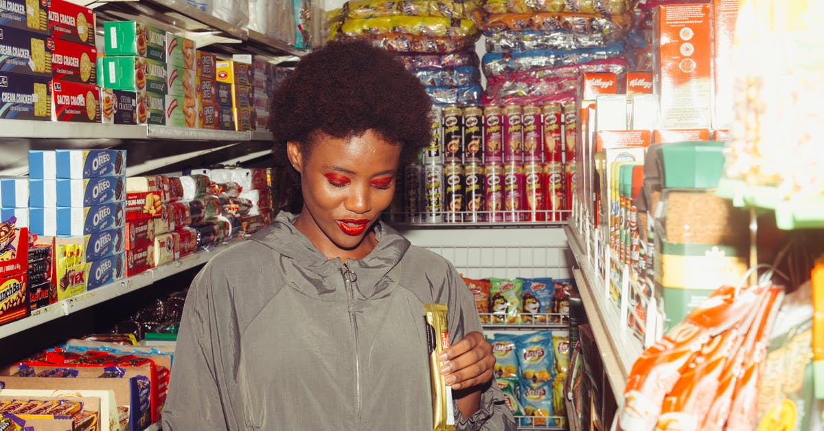 In which EU countries it is illegal to carry/have a kubotan keyring at customs? - Positive ethnic woman choosing food in grocery store In which EU countries it is illegal to carry/have a kubotan keyring at customs? - Positive ethnic woman choosing food in grocery store